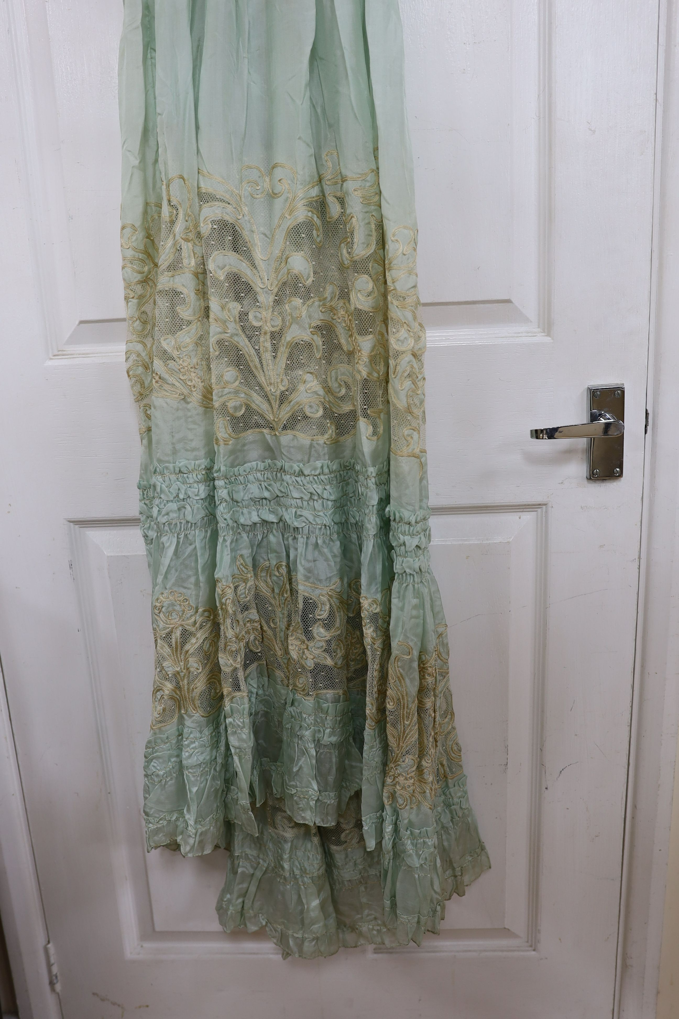 An Edwardian fine turquoise silk and ecru embroidered and lace ladies dress